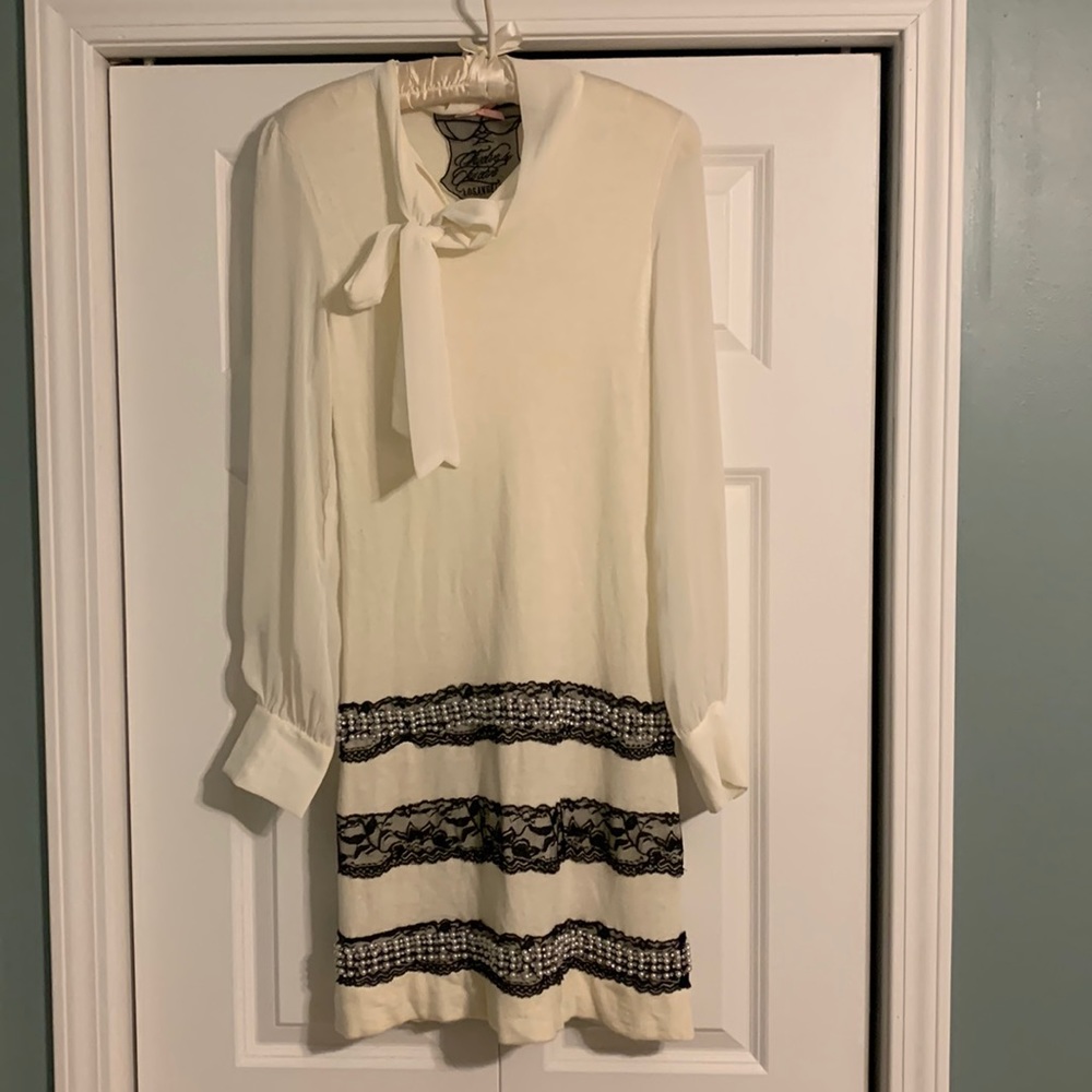 Vintage twelve by twelve mini dress with beading, a neck tie, and sheer sleeves!